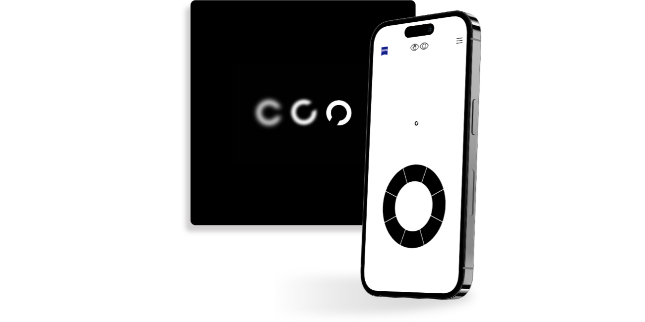 Un smartphone cu un ecran de exercițiu ZEISS Test de Verificare a Vederii Online, stând în fața unui buton pătrat negru care prezintă cercuri diferite, ascuțite, cu o deschidere în direcții diferite, utilizat în mod obișnuit la testele de vedere.