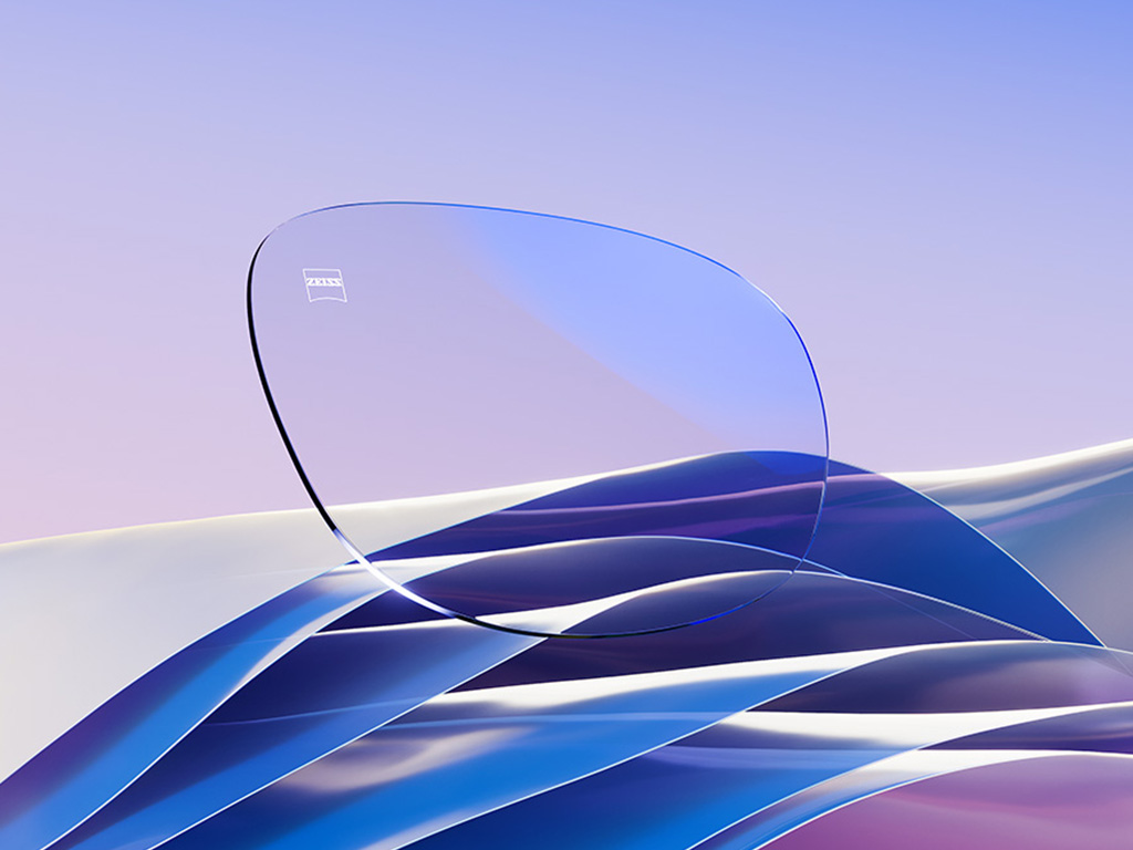 O reprezentare CGI a unor lentile incolore de ochelari de vedere cu un reflex albastru subtil.