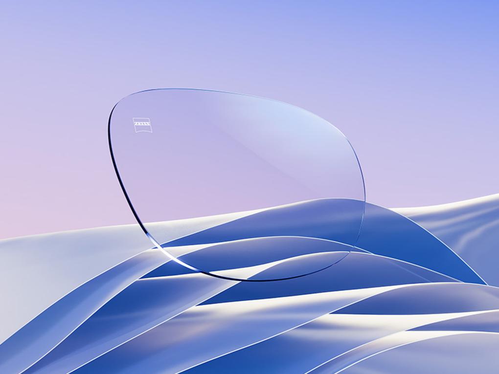 O reprezentare CGI a unor lentile incolore de ochelari de vedere cu un reflex albastru-alb subtil.