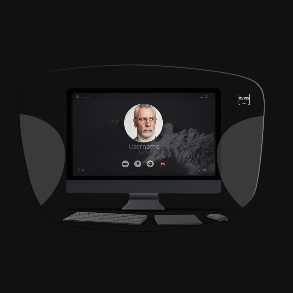 Vizualizarea unui computer desktop, a tastaturii, a mouse-ului și a unei cărți printr-o ilustrație schematică a unor ochelari cu lentile ZEISS Office arată că totul este clar datorită zonelor optimizate pentru vederea la apropiere și semi-distanță.