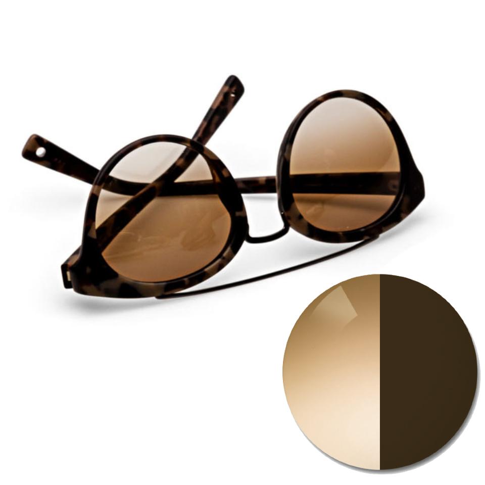 Ochelari cu ZEISS AdaptiveSun degrade maro și un punct de culoare în nuanță de culoare deschisă și închisă