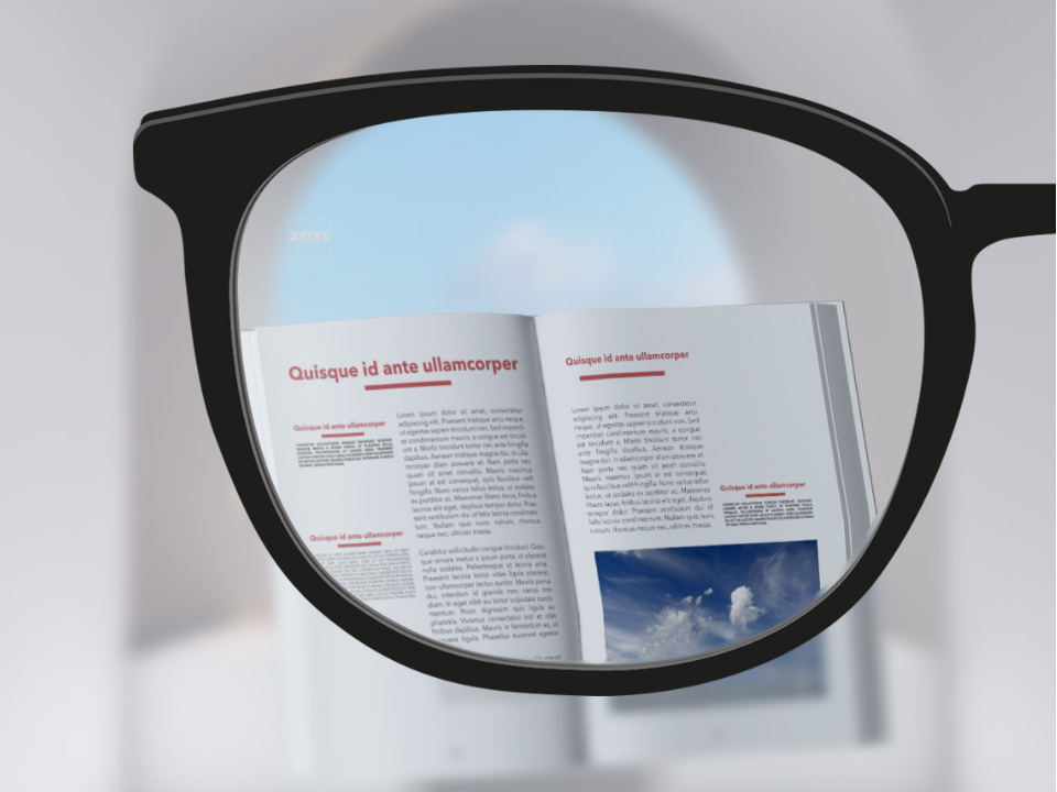  O imagine cu punct de vedere cu lentile monofocale ZEISS ClearView, cu o carte și lentile incolore, chiar și la marginile lentilelor. 