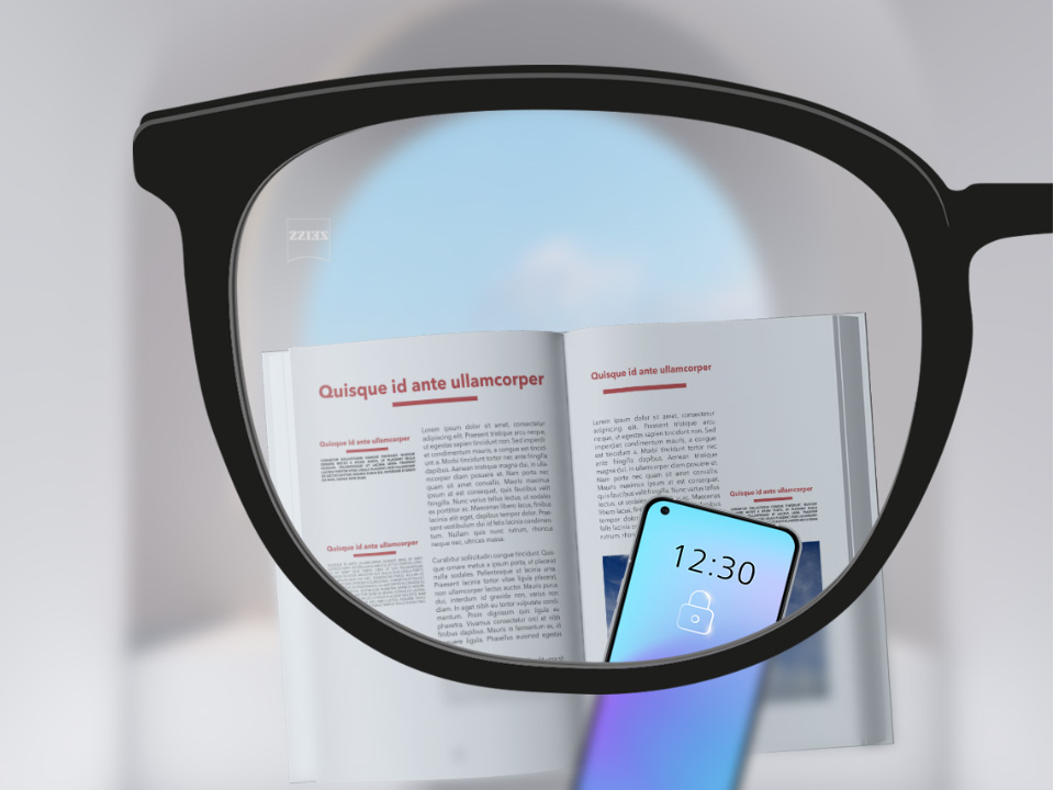 O imagine cu punct de vedere cu lentilele monofocale ZEISS SmartLife cu un smartphone, o carte și lentile complet incolore.